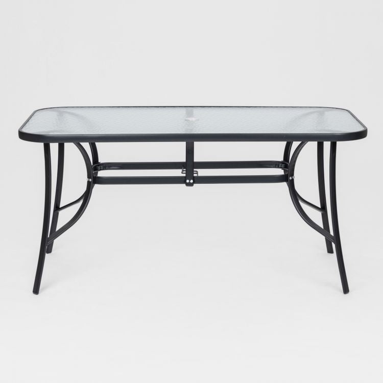 Set pranzo con tavolo 150x90 cm top trasparente e 4 sedie in acciaio e textilene blu marino